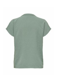 Korte mouwen top van zacht, textuurstof, lichtgroene kleur, met een klassieke kraag en een relaxte pasvorm, met een rechte onderzoom.