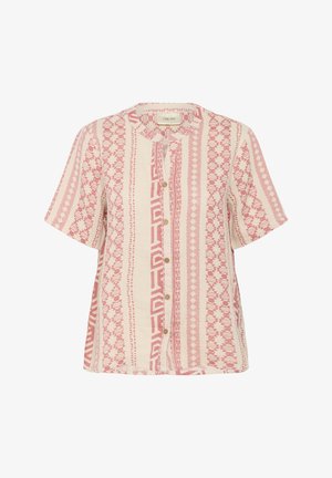 Rövid ujjú, gombos ing krémszínben, rózsaszín geometriai mintákkal. Jellemzője a kerek nyakú kialakítás és a könnyű, texturált anyag.