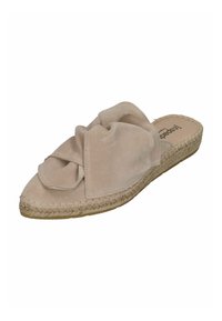 Beige suede slip-on shoe with a knotted front design, espadrille-style jute sole, rounded toe, and smooth texture.