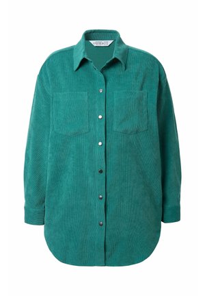 Teal Kordhemd mit spitzem Kragen, frontaler Knopfleiste und zwei Brusttaschen. Mit langen Ärmeln und abgerundetem Saum.
