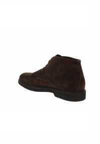 Brown suede ankle boots with a rounded toe, textured surface, minimal lacing, and a durable rubber sole. Side view showcases clean lines.
