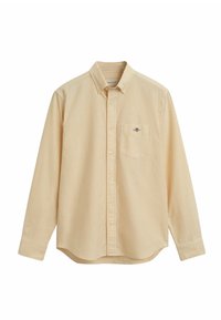 Camicia a maniche lunghe a righe gialle e bianche con colletto button-down, taschino sul petto e dettaglio con logo. Tessuto in cotone, vestibilità regolare.