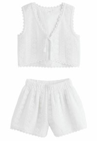 White two-piece set featuring a cropped sleeveless top with a tie closure and elastic waistband shorts, both in textured fabric with scalloped edges.