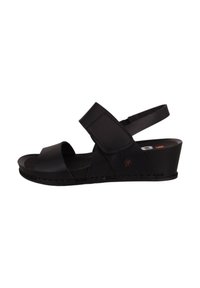 Sandalias de cuña negras con correas ajustables, que cuentan con un acabado liso y mate y una plantilla contorneada para mayor comodidad.