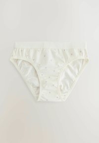 Sous-vêtements en coton de couleur crème clair avec de petits motifs de cœurs lavande, taille élastique et texture douce, présentant des coutures latérales froncées.