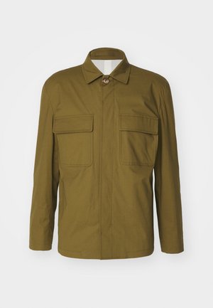 Olive green jacket with a buttoned collar, front zipper, and two chest pockets. Made from a smooth, lightweight fabric with a straight cut.