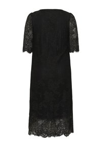 Robe noire longueur genou avec superposition en dentelle florale, manches courtes en dentelle transparente et ourlet en dentelle festonné.