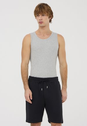 - Spodnie treningowe