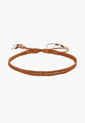 Pruun punutud nahkvyö, millel on topeltkoonused ja reguleeritavad sidemed. Metallist tarvikud mustade helmestega sulgemisel.