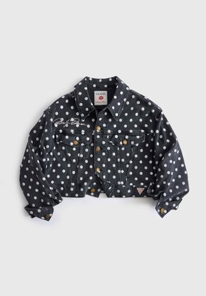 Zwarte cropped spijkerjack met witte polkadots, knoopsluiting, borstzakken en "Guess" logo patches en borduursels.