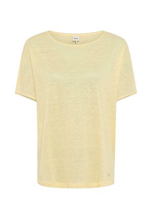 T-shirt jaune clair à manches courtes et col rond, avec une coupe décontractée et une petite étiquette de marque près de l'ourlet.