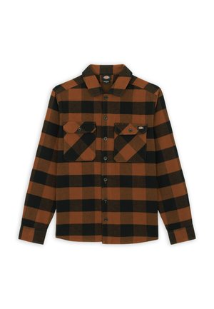 Long-sleeve shirt in orange and black plaid pattern, made of a textured fabric. Features two chest pockets and buttoned front.