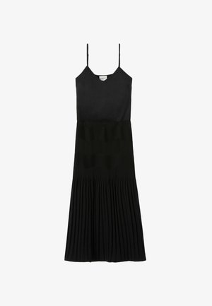 Abito nero con sottili spalline, corpetto aderente e gonna plissettata. Realizzato in tessuto liscio con una sezione inferiore strutturata.