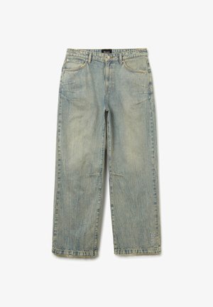 Light blue denim jeans with a relaxed fit, five pockets, and subtle fading. Features topstitching and a logo near the lower hem.