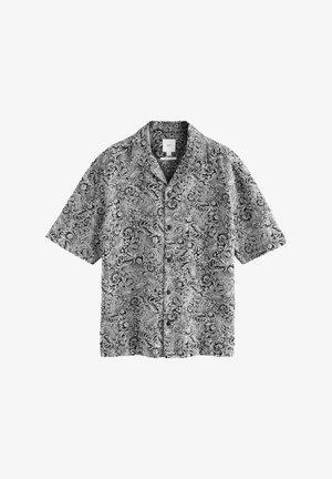 Short-sleeve shirt in black and white paisley pattern, made of lightweight fabric, featuring a collar and button-down front.