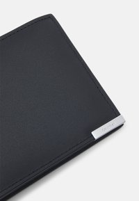 Calvin Klein MODERN PLAQUE TRIFOLD UNISEX - Wallet - black