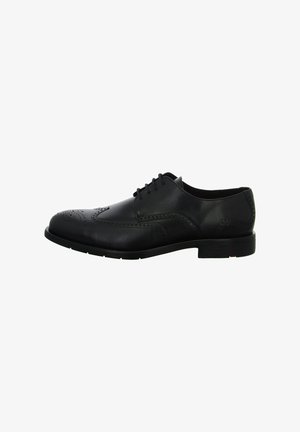 Zwarte leren dresschoenen met brogue-details, vetersluiting, ronde neus en een lage rubberen zool. Soepele textuur met een gepolijste afwerking.