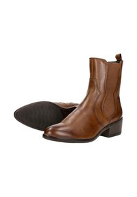 Bruine leren enkellaarzen met elastische zijkanten, ronde neus, lage blokhak en een getextureerde rubberen loopzool. Gladde afwerking met stiksel details.