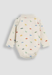 Hosszú ujjú baba body világos bézs pamutból, amely vidám, színes dinoszauruszok mintázatával rendelkezik, különböző árnyalatokban és formákban.