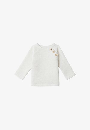 Pull crème à manches longues avec un motif texturé, encolure ronde, et trois boutons en bois sur l'épaule gauche pour la fermeture.