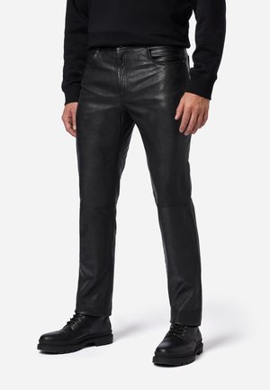 TRANT - Leather trousers - schwarz