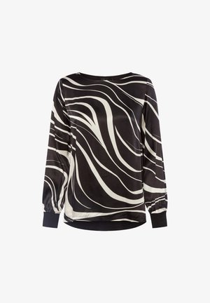 Black long-sleeve blouse with white wavy stripes, round neck, and elasticized cuffs. Soft fabric with a relaxed fit.