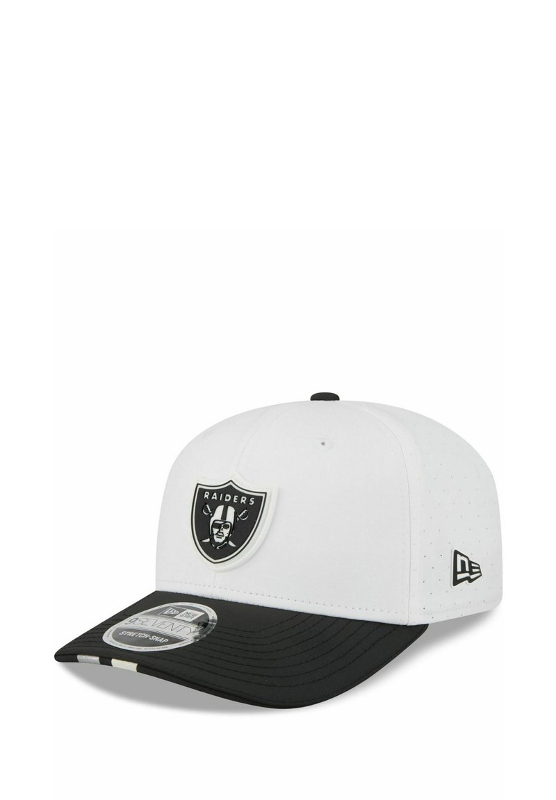 White and black Raiders baseball cap with team shield logo on front and New Era logo on side, curved black brim with sticker label.