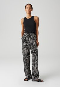 OPUS - Spodnie materiałowe