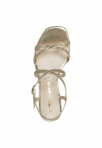 Gold strappy sandal with a mesh design, open toe, ankle strap, and a smooth beige insole featuring metallic branding. Size 37.