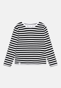 Haut à manches longues avec des rayures noires et blanches, en tissu de coton doux. Présente un col rond et une étiquette au bas.