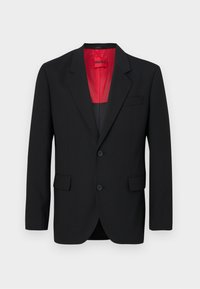 Black blazer made of smooth fabric, featuring a red lining, two front pockets, and two buttons. Notched lapels add structured detail.