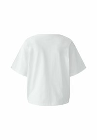 Witte katoenen t-shirt met een ontspannen pasvorm, korte mouwen en een ronde halslijn. Een gladde textuur, eenvoudig ontwerp en geen zichtbare versieringen.