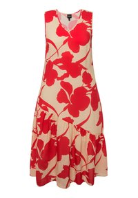 Bezramenné béžové šaty s velkým červeným květinovým vzorem, výstřihem do V a asymetrickým řaseným lemem.