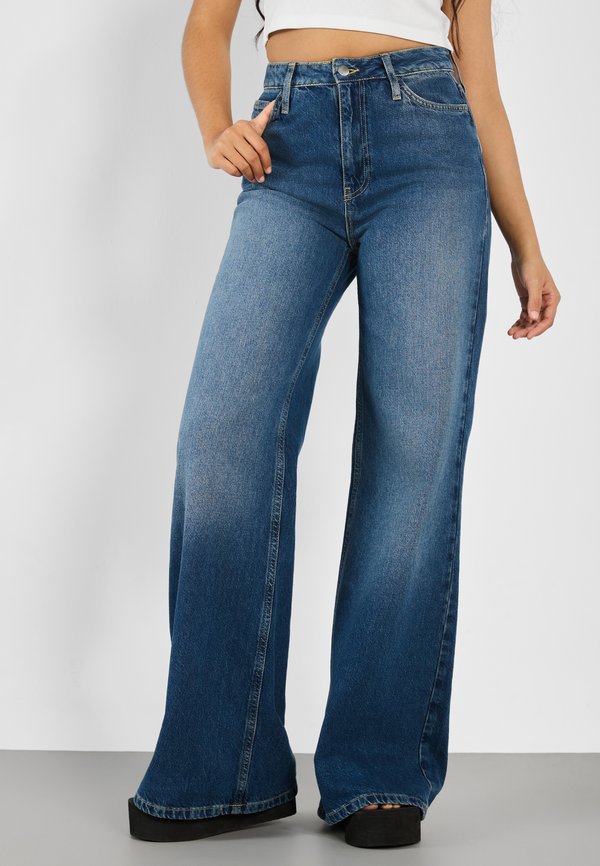 Flared Jeans - dirty denim
