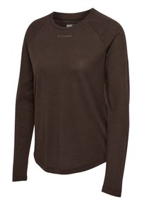 Brun långärmad skjorta med rund hals och raglanärmar, tillverkad av strukturerad tyg. Har en liten präglad logotyp på bröstet.
