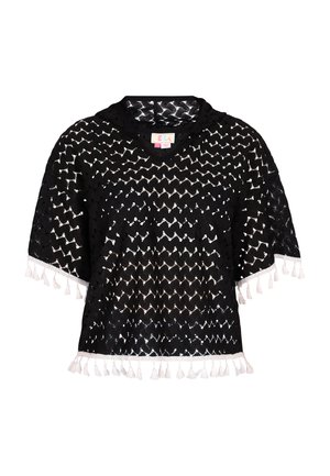 Fekete horgolt felső, laza szabással, cikkcakk mintával és fehér bojtokkal az alján. V-nyakú fazon, rövid ujjakkal.