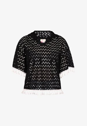 Fekete horgolt felső, laza szabással, cikkcakk mintával és fehér bojtokkal az alján. V-nyakú fazon, rövid ujjakkal.