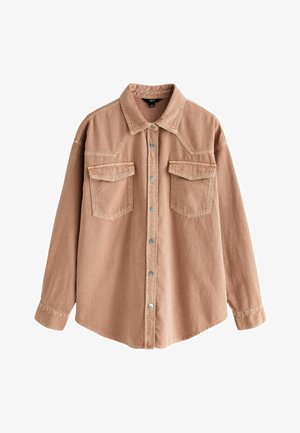 Jasnobrązowa koszula dżinsowa z klasycznym kołnierzykiem, dwoma kieszeniami na piersi i zatrzaskami. Posiada długie rękawy oraz lekko zaokrąglony dół.