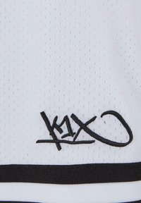 White sports jersey featuring a perforated texture, black signature logo, and contrasting black horizontal stripe at the bottom.