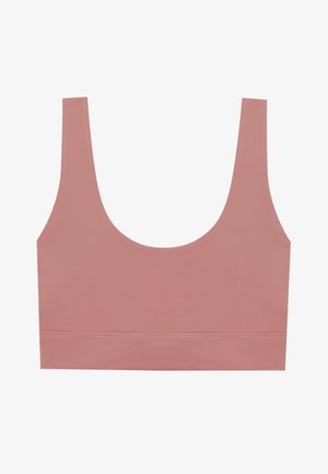 Roze naadloze bralette met brede banden, lage ronde halslijn en een gladde textuur. Geen zichtbare bevestigingsmiddelen of extra accenten.
