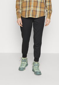 The North Face Träningsbyxor - black