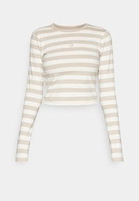 Long-sleeve cropped top in beige and white stripes, made of soft cotton blend, featuring a round neckline and a small logo on the chest.