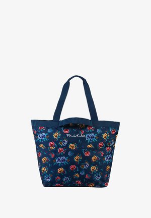 Blaue Blumentasche mit dunklen blauen Trägern, die ein lebhaftes Blumenmuster in Rot, Gelb und Blau zeigt und mit "Frida Kahlo" gebrandet ist.