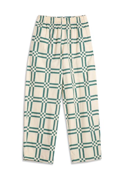 Pantalon couleur crème avec motif à carreaux verts et taille élastique, présenté à plat sur fond blanc.