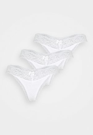 White lace thong panties set of three, featuring delicate lace trim, small central bows, and a soft, sheer fabric texture.