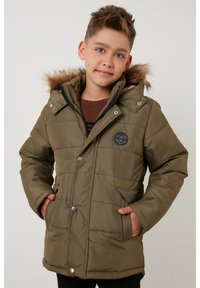 Geselecteerd, dark khaki