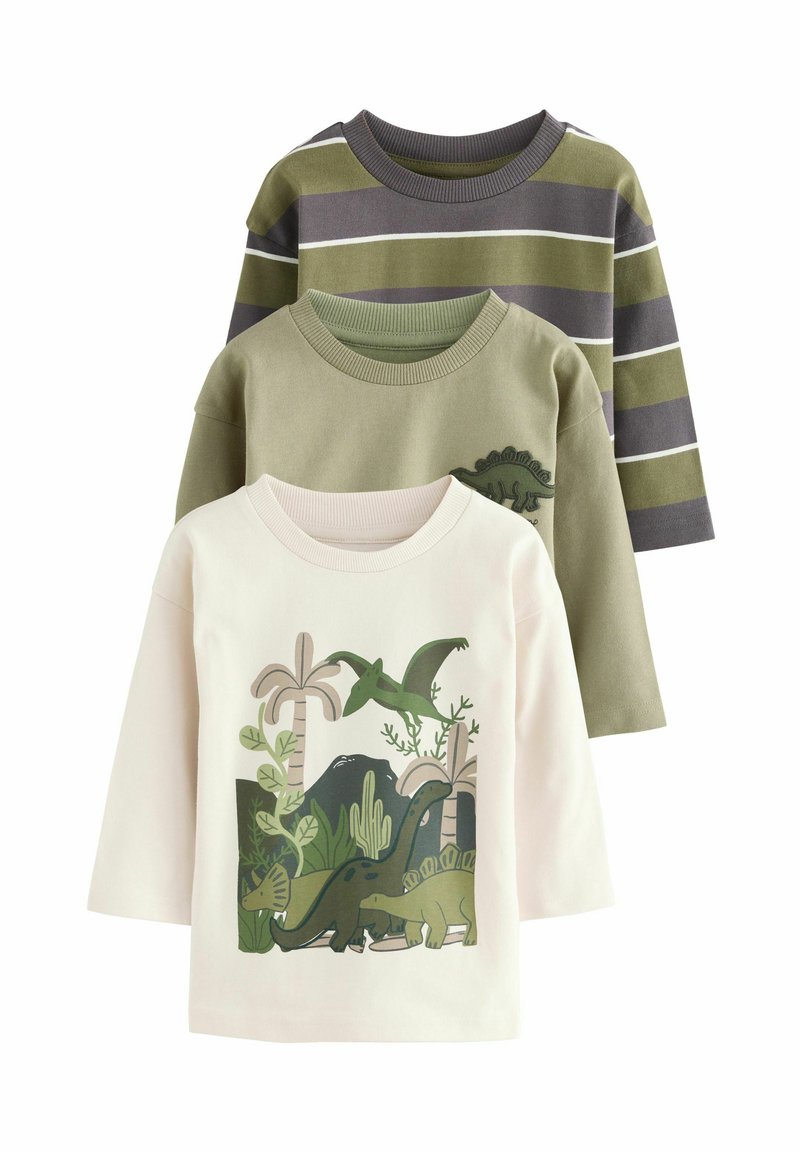 Drei Langarm-T-Shirts: gestreift in olivgrün und grau, einfarbig olivgrün und cremefarben mit Dinosaurier-Design. Aus Baumwollmaterial, lässige Passform.