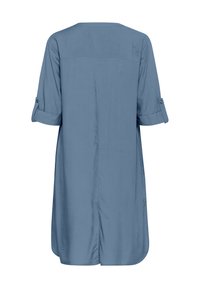 Tunic blu, a maniche corte, con scollatura rotonda, taglio dritto e polsini delle maniche con bottoni. Tessuto morbido con vestibilità comoda, orlo posteriore più lungo.