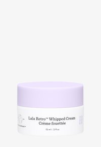 White jar with a lilac lid, labeled "Lala Retro™ Whipped Cream," 15 ml/.5 fl oz, featuring smooth texture and simple design.