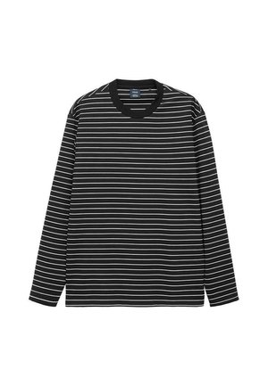 Camiseta de manga larga a rayas en blanco y negro, hecha de algodón suave. Cuenta con un cuello redondo y un cuello acanalado negro en contraste.